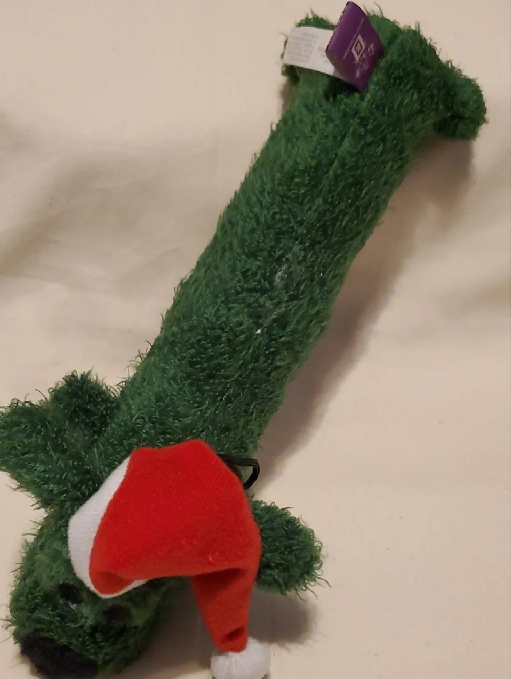 Green Loofa Dog Toy with Santa Hat